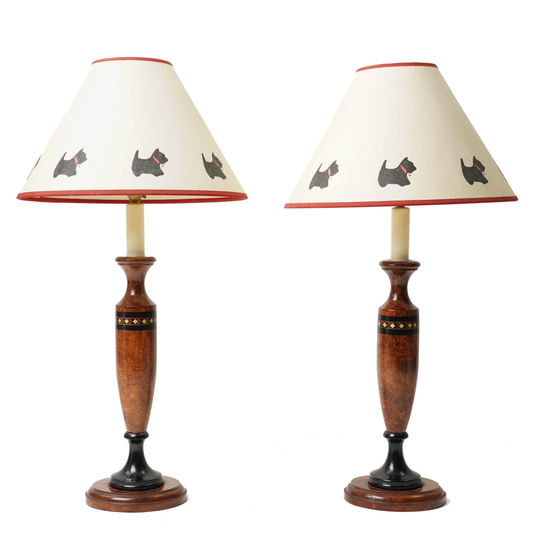 Pair of walnut scumbled pine table lamps, the cream shades with a band of stencilled Scottish Terriers, including shades H58cm (2)