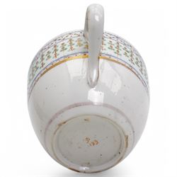 Pinxton porcelain trio, pattern no.193, comprising coffee can, teacup and saucer, decorated with green and gilt stylised sprigs and red and gilt dot borders, teacup with painted marks to base (3)