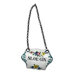 Seventeen mid 18th century and later enamel wine labels, one example of heart shaped form, the rest of cartouche and escutcheon form, various titles including Claret, Rum, Sloe Gin, Port, Whisky, Cowslip, Cherry-Brandy, etc., largest example W7cm 