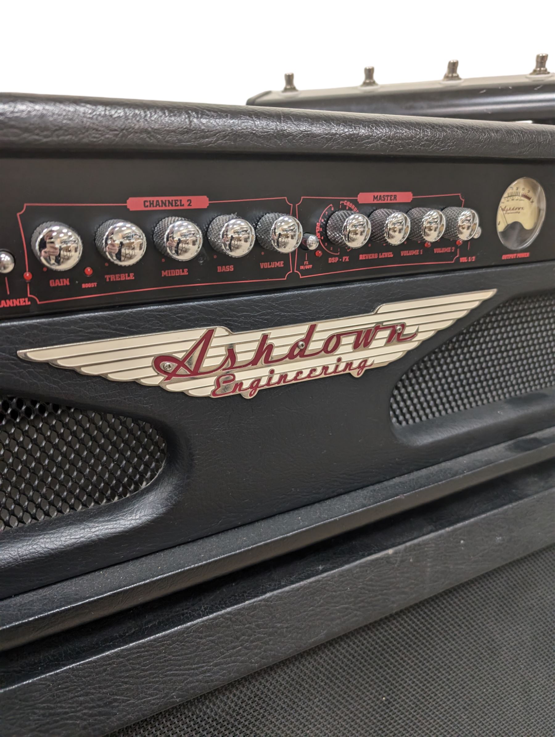 Ashdown Engineering Fallen Angel 60 DSP guitar amplifier head model no. FA60H, serial no. 18930406, 4 x 12 speaker cabinet, model no. FA 412A serial no. 20210106, and a four-button foot pedal, head H24cm, W70cm, cab H78cm, W70cm