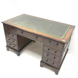 Victorian style mahogany twin pedestal desk, green leather inset top, nine graduating drawers, ogee bracket supports, W138cm, H78cm, D77cm