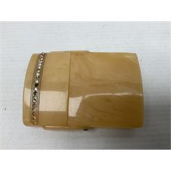 Mother of pearl and abalone inlaid card case, with central diamond shaped panel engraved with foliate decoration, together with a simulated mother of pearl card case of book form with green sun rays to cover, and simulated wood effect cigarette case with hinged lid with diamante style banding, largest L10cm