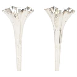 Pair of Victorian silver mounted trumpet vases, with fluted beaded rim, tapering knopped stem and upon circular weighted foot, hallmarked Horace Woodward & Co Ltd, London 1898, H22cm