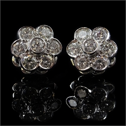  Pair of 18ct white gold flower head stud ear-rings, hallmarked  