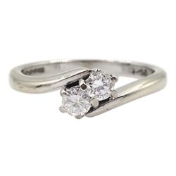 18ct white gold two stone round brilliant cut diamond crossover ring, hallmarked, total diamond weight 0.25 carat 
