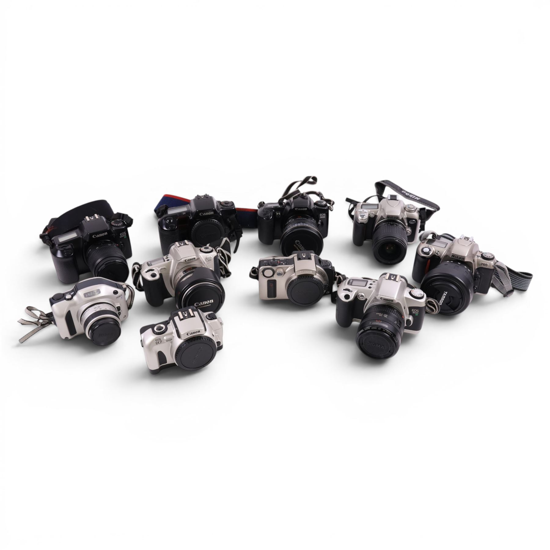 Ten digital cameras, including seven Canon EOS examples, Nikon F65, Nikon Pronea and Nikon F75