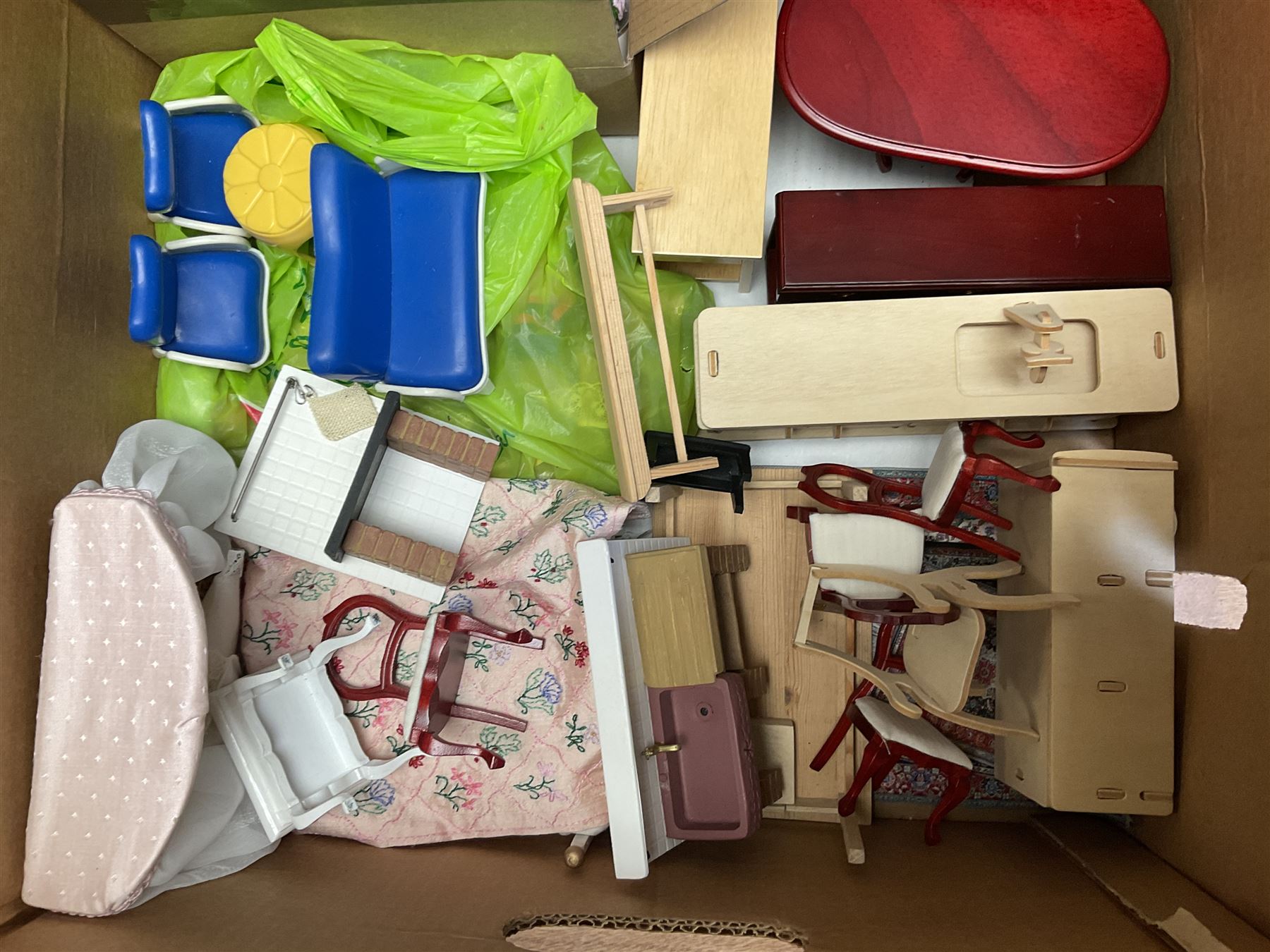 'The Hollies' - good quality sectional wooden doll's house in the form of a Georgian style four-storey bay windowed town house with simulated brick front elevation, rendered sides, off-set corner stonework, faux slate-hung top floor with flat roof and chimney stack, working sash windows, iron railings around front basement courtyard with hinged front elevation to two rooms with  spiral staircase, side hinged central section approached by external steps with iron balustrades to the sides leading to a front door, entrance hall with stairs to landing and two rooms on two floors with dado panelling and fire-surrounds, the top floor with top hung front elevation revealing stairs to a landing and bedroom; wired for electricity L51cm D65cm H107cm including chimney; together with a good quantity of quality wooden furniture and accessories including piano, dressers, bookcase and books, rugs, double half-tester bed, metalware, pictures etc