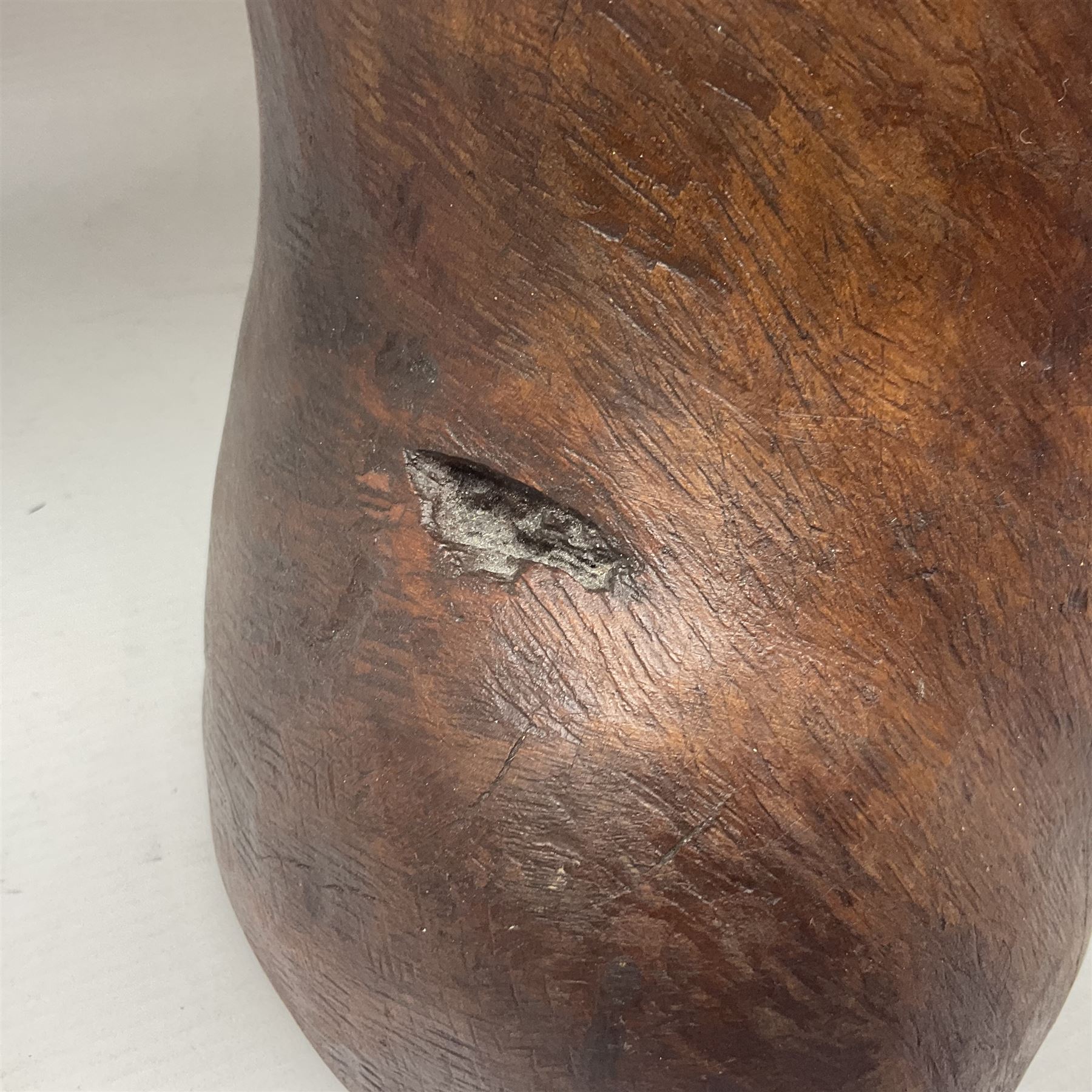 Helen Skelton (British 1933 – 2023): Large carved wooden sculpture, modelled as a male torso, H40cm. Born into an RAF family in 1933 in Kent and travelled the world extensively during her childhood. After settling in Bridlington, Helen immersed herself in painting, textiles, and wood sculpture, often inspired by nature's beauty. Her talent was showcased in a one-woman show at Sewerby Hall and recognised with the sculpture prize at Ferens Art Gallery in 2000. Sadly, Helen’s daughter passed away from cancer in 2005. This loss inspired Helen to donate her sculptures to Marie Curie upon her passing in 2023.