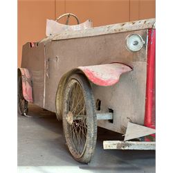 1930's open top two seater electric cycle sports car, in barn find condition, powered by 12v batteries and an electric motor. N.B. There is photographic evidnce to suggest this car was previosuly road registered with 'DMT8' liscence plate. L270cm, W100cm.  - COLLECTION BY APPOINTMENT FROM: The White House, Thirsk Road, Easingwold, York, YO61 3NF - CALL 01723 507111 TO ARRANGE