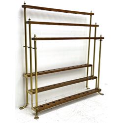Late 20th century three tier brass and mahogany stick stand, thirty-six stick capacity, on splayed brass feet, turned finals 