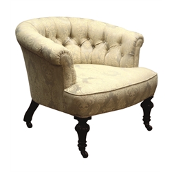  Victorian walnut framed tub shaped armchair, buttoned back with deep seat, upholstered in damask fabric, on turned baluster supports with ceramic castors, W83cm, D80cm  
