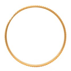 21ct gold bangle with engraved decoration