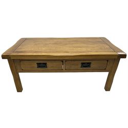 Contemporary medium oak coffee table, rectangular top fitted with two drawers, on square supports