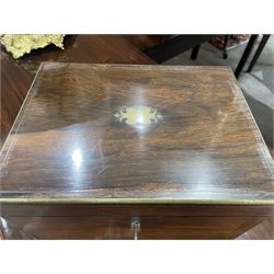  Victorian brass inlaid rosewood dressing table box, retailed by F.L. Hausburg, Liverpool, the lid centred by a brass cartouche, opening to reveal letter store to lid underside, above a fitted interior, with ten mounted cut glass jars, bottles and manicure set, within lift out leather trays, above jewellery drawer, with key, H17cm D24cm