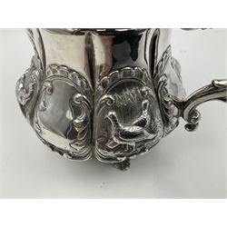 Victorian silver three piece tea service, comprising teapot, twin handled open sucrier, and milk jug, each of bellied form with acanthus capped scroll handles, the sides embossed with alternating scroll edged vacant panels and panels containing a pair of birds, upon four palmette feet, the teapot with ivory insulators to handle, and bird finial to the hinged domed cover, hallmarked William Hunter & Son, London 1861, teapot H19cm, including handles sucrier H13.5cm, including handle milk jug H12cm

This item has been registered for sale under Section 10 of the APHA Ivory Act