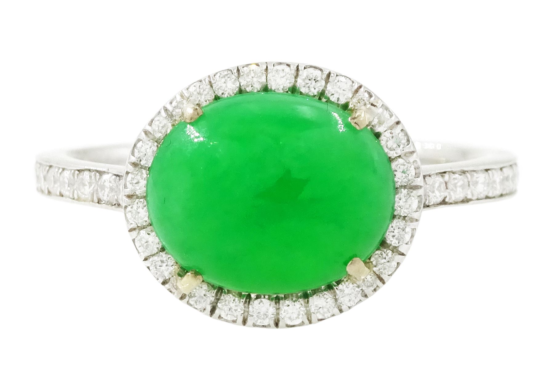 Platinum jadeite and diamond cluster ring, single oval cabochon cut jadeite of 2.20 carat, surrounded by round brilliant cut diamonds and diamond set shoulders, stamped Plat