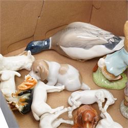 Royal Copenhagen duck No.1934, another of a puppy No.1311, another of two birds No.6811, two Beswick Beatrix Potter figures and other animal ornaments