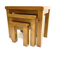 Pine nest of three tables, square supports 