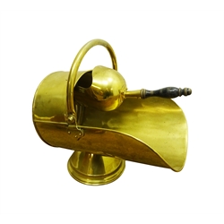  Edwardian brass helmet shaped coal scuttle and shovel with collar turned ebonised handle, W50cm   
