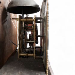 Cooper of Derby - Early 18th century 30hr oak longcase clock c1740, with a flat topped hood and plain frieze beneath, square hood door flanked by turned pilasters with wooden capitals, long trunk door with a wavy top on a square plinth with applied skirting, brass dial with cast spandrels and an engraved dial centre, chapter with Roman numerals, quarter hour markers, single steel hand and date aperture, chain driven countwheel striking movement, sounding the hours on a bell. With weight and pendulum.