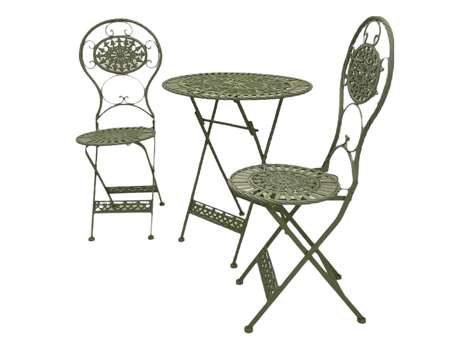 Oval pale green folding garden table and two folding chairs The