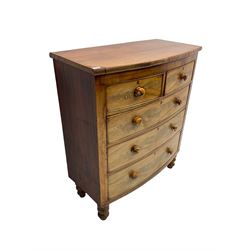 Late 19th century mahogany bow-front chest, fitted with two short and thee long graduating cockbeaded drawers, raised on turned supports