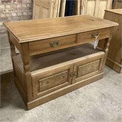 Late Victorian oak buffet stand, moulded rectangular top over under-tier and double cupboard, enclosed by panelled doors, on skirted base - THIS LOT IS TO BE COLLECTED BY APPOINTMENT FROM THE OLD BUFFER DEPOT, MELBOURNE PLACE, SOWERBY, THIRSK, YO7 1QY