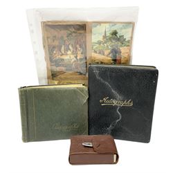 2 autograph albums, containing signatures including Harry Corbett Sooty, Dave Morris, Marion Saunders, Max Bygraves and signed photographs, quantity of postcards depicting the Lords Prayer and playing cards in case