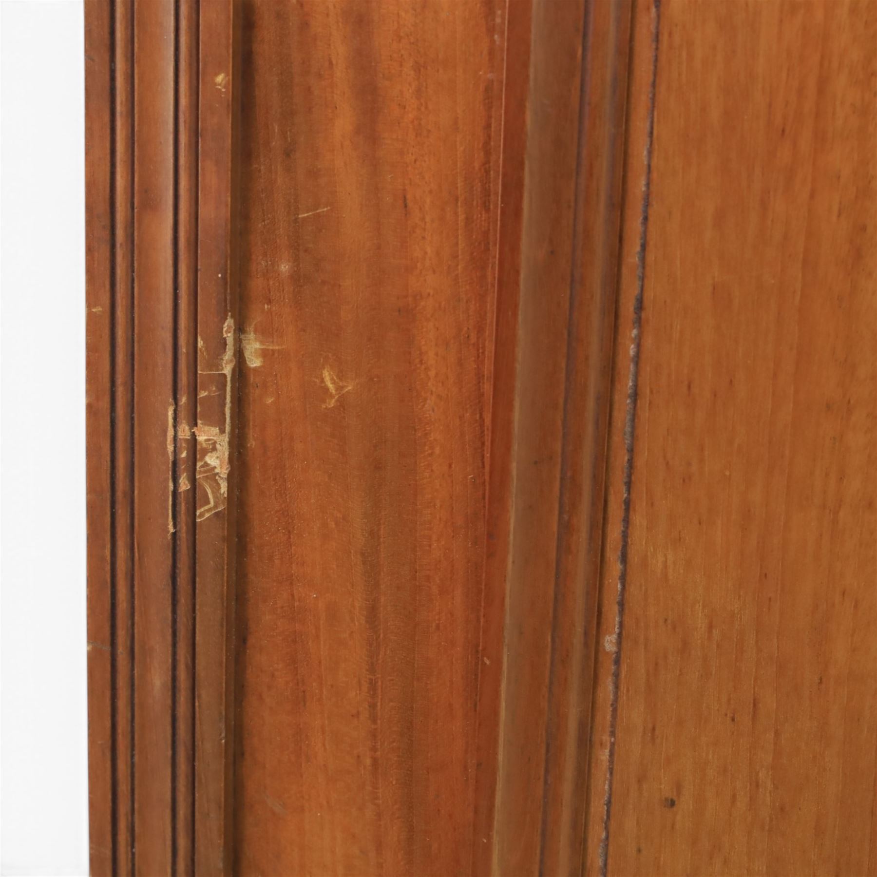 Edwardian walnut double wardrobe, fitted with two panelled doors, opening to reveal fitted interior with hanging space, three sliding linen trays and three drawers