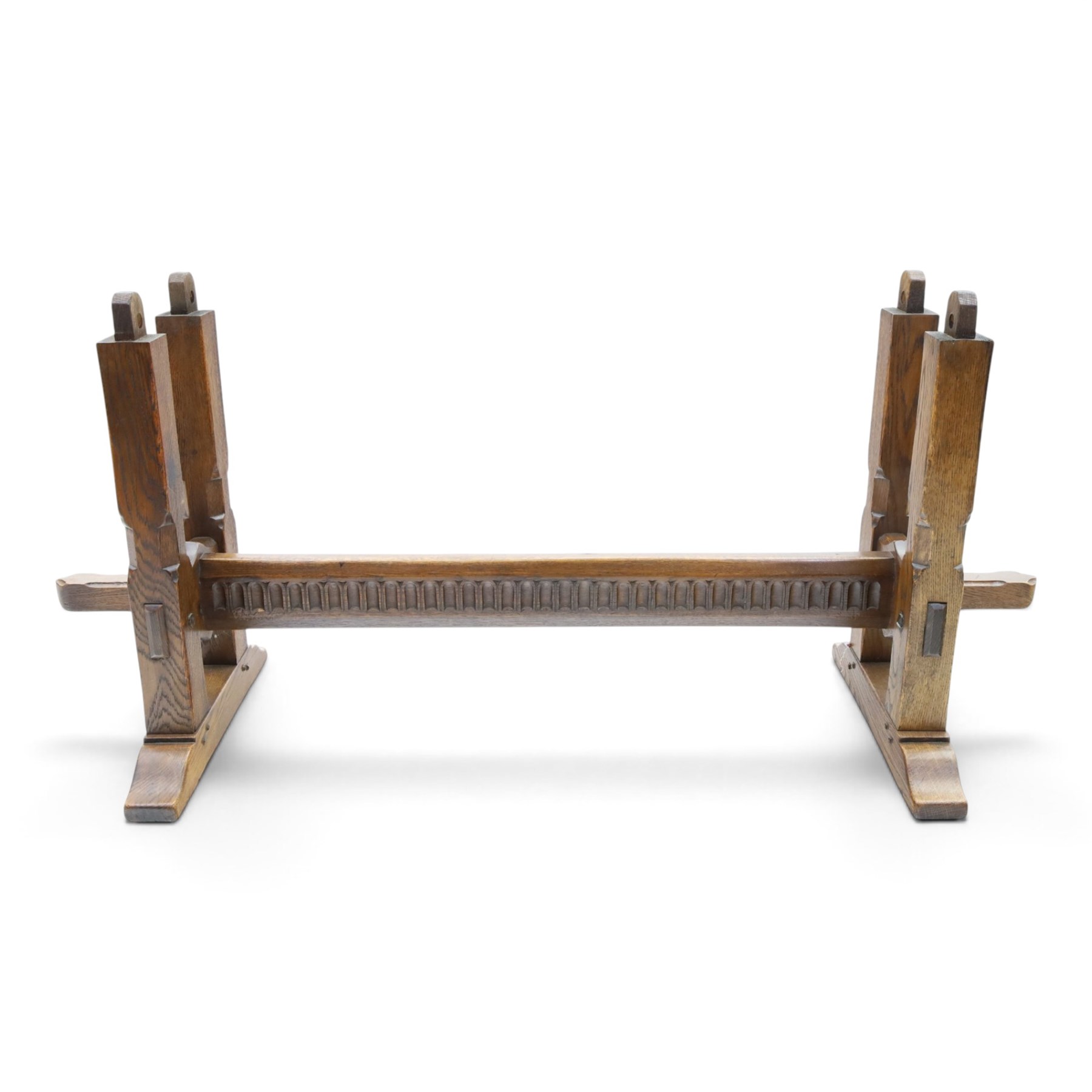 Rupert Griffiths for Monastic Woodcraft - oak 6ft refectory dining table with set six (4+2) matching chairs, rectangular top with arcaded frieze, with trestle base with further arcaded carved stretchers, chairs with carved rails and finials, leather wrapped seats with stud detail, turned supports united by carved stretcher