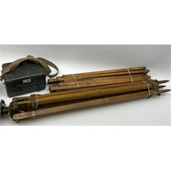 WW2 green painted brass military artillery theodolite, marked 'Director No.7 (Mk.2) OS 1873 GA', dated 1942, serial no.11435, on oak and brass telescopic tripod with green painted metal carrying case; together with five additional unrelated oak and brass telescopic tripod legs