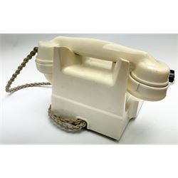 Vintage cream Bakelite telephone, with chrome dial, pull out number tray and plaque inscribed Recall, H15cm.