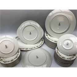 Royal Doulton tea and dinner wares decorated in the Vanity Fair pattern, to include twelve dinner plates, twelve side plates, eleven bowls, three lidded tureens, ten teacups, sauceboat on stand etc, together with boxed Royal Worcester plate, six Royal Worcester ramekins etc