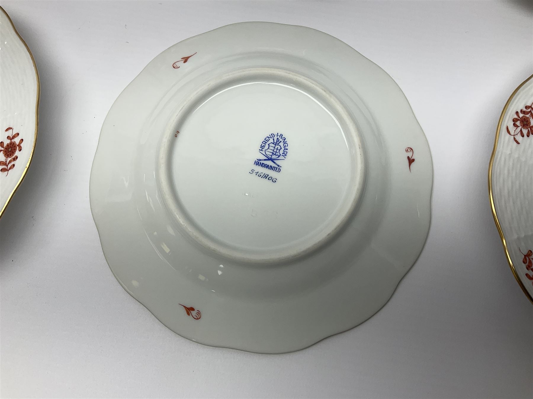 Herend Chinese Bouquet Rose pattern tea service comprising teapot, coffee pot, open sucrier, six cups and saucers, six tea plates, cream jug and stand, milk jug, two teabag holders, preserve pot, two leaf shaped dishes, four egg cups, salt & pepper pots, pair side plates and another plate