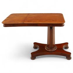 William IV mahogany reading table, the rectangular top with rounded corners and moulded edge, one end fitted with two hinged adjustable reading slops with two rests, the sliding top with a sprung stay mechanism, supported on a single tapered faceted column  with turned collar on a quatreform base with compressed bun feet
