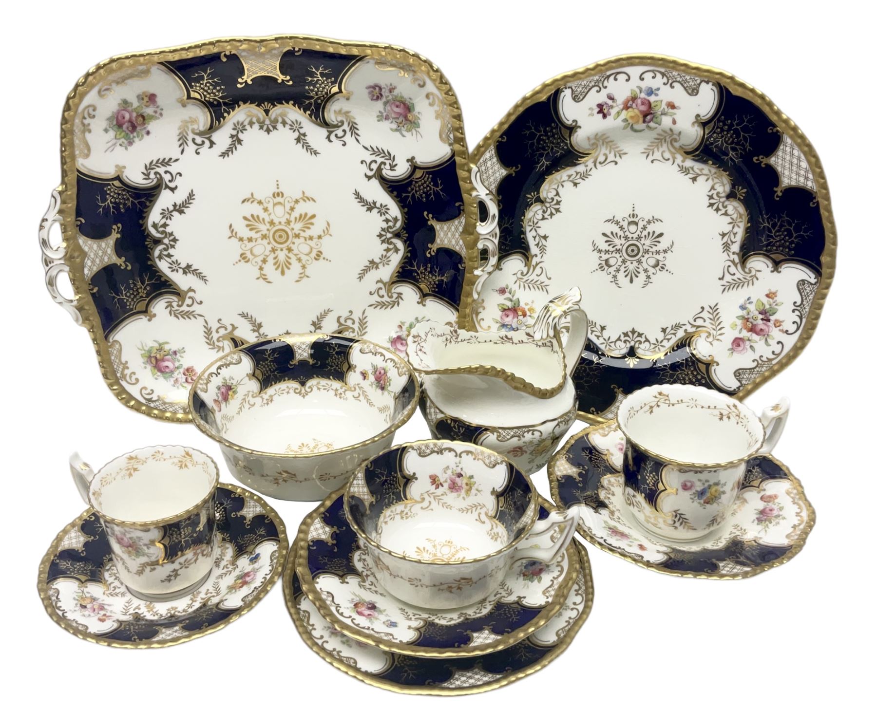 Coalport cobalt blue batwing pattern tea wares, decorated with finely enamelled floral sprays within gilt reserves, comprising teacup trio, coffee can and saucer and other cup and saucer, twin handled cake plate, milk jug and open sucrier, and circular plate retailed by T. Goode & Co London, pattern no Y2665,  all with green Coalport AD 1750 marks beneath, largest W26cm (11)