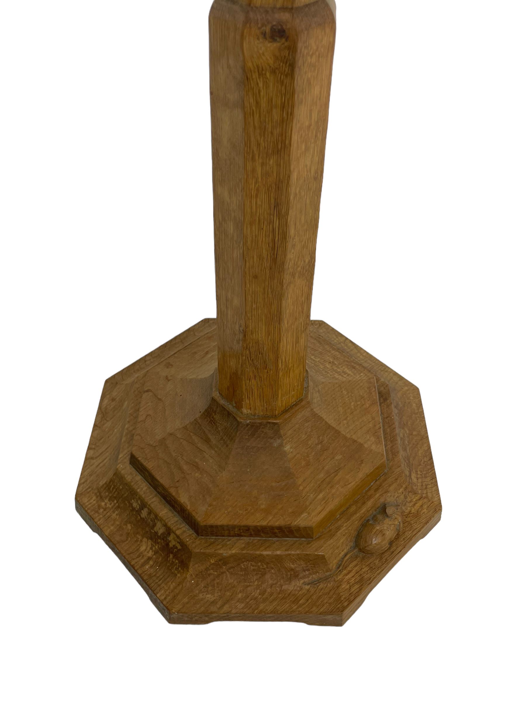 Mouseman - oak standard lamp, octagonal tapered column on octagonal base carved with mouse signature, by the workshop of Robert Thompson, Kilburn