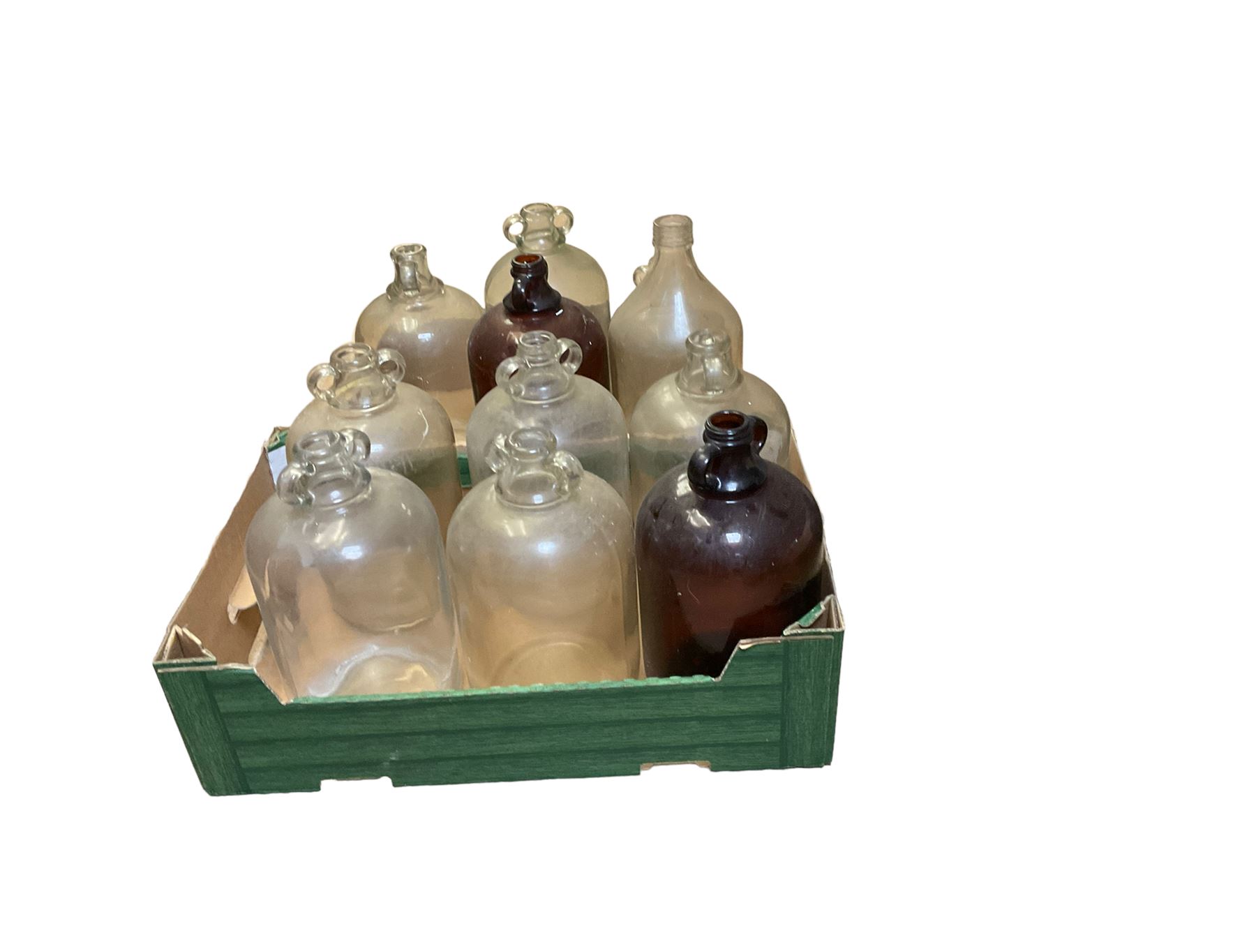 Eleven glass demijohns, including two brown glass examples