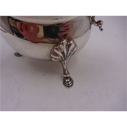 Victorian silver sauce boat, of typical plain form, with shaped rim and acanthus capped flying scroll handle, upon three hoof feet, hallmarked Walker and Hall, Sheffield 1899, including handle H12cm