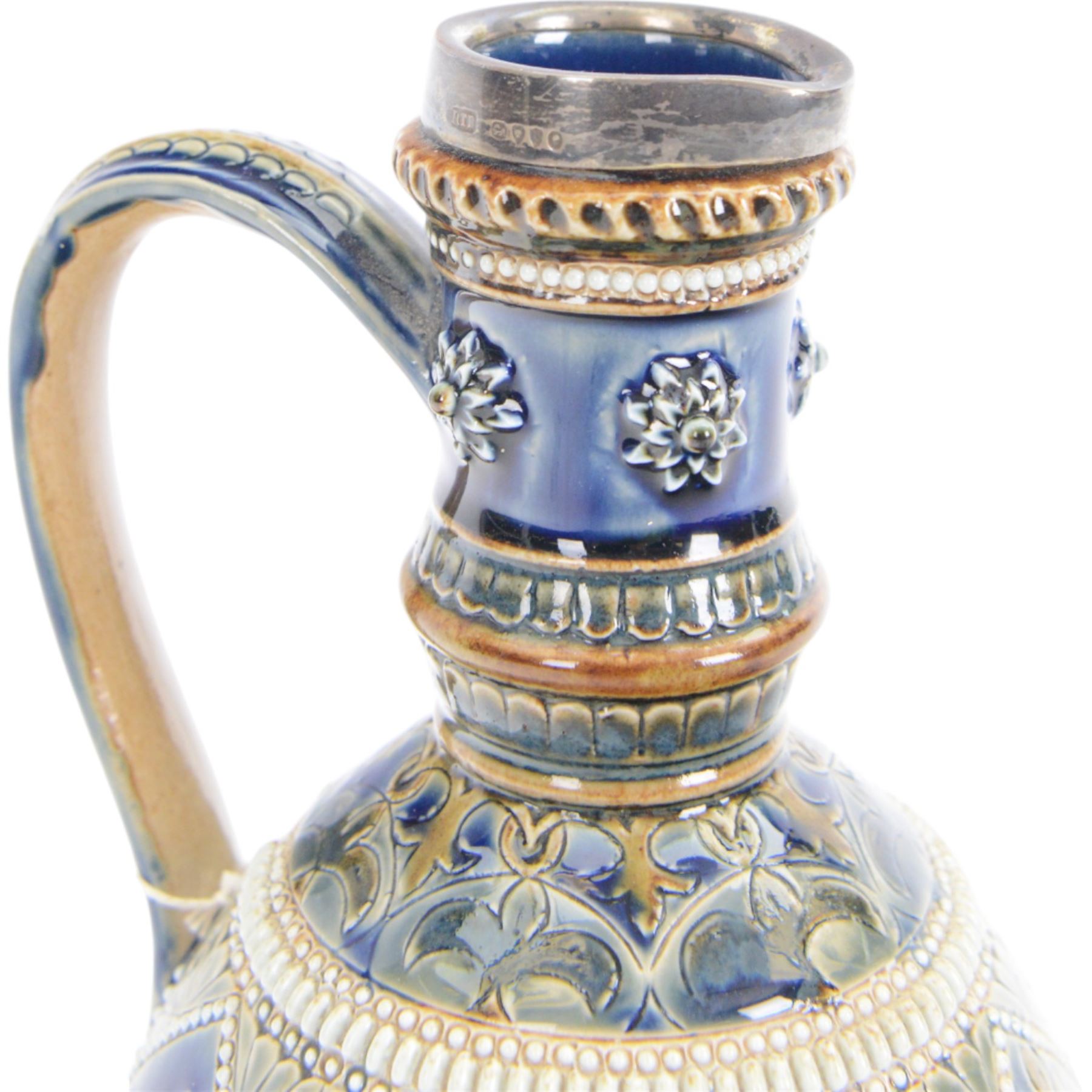 Doulton Lambeth ewer with silver collar, hallmarked, by Elizabeth Sayers, decorated with a central panel of flowers, H25cm
