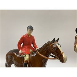 Beswick Hunting Group, comprising huntswoman on bay horse, model no 1730, huntsman on bay horse, model no 1501, together with standing fox, model no 1440 and twelve fox hounds, all with printed marks beneath