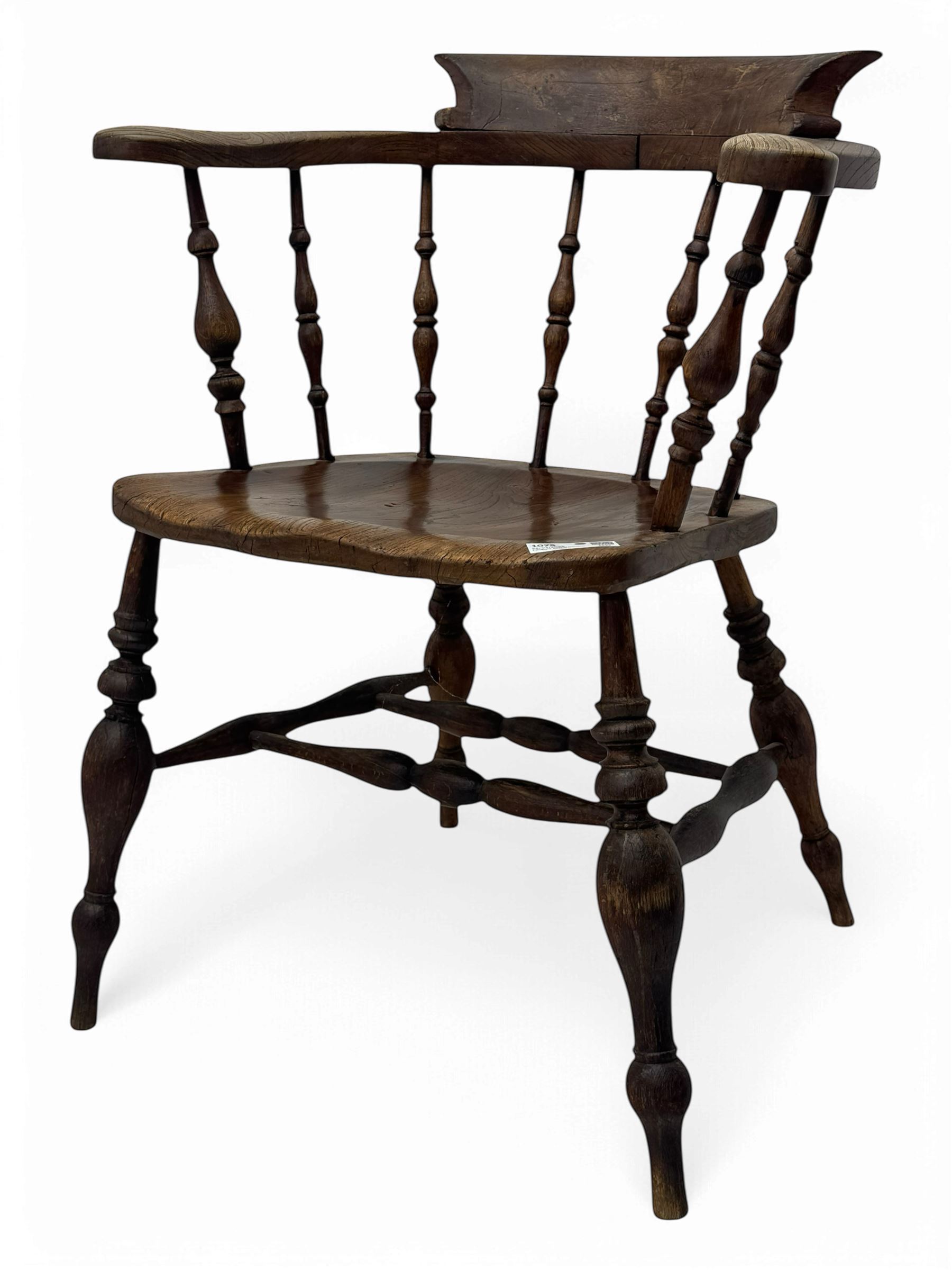 19th century elm and beech smoker's bow armchair, shaped arms over turned spindle gallery and dished seat, on turned supports united by double H-shaped swell turned stretchers 