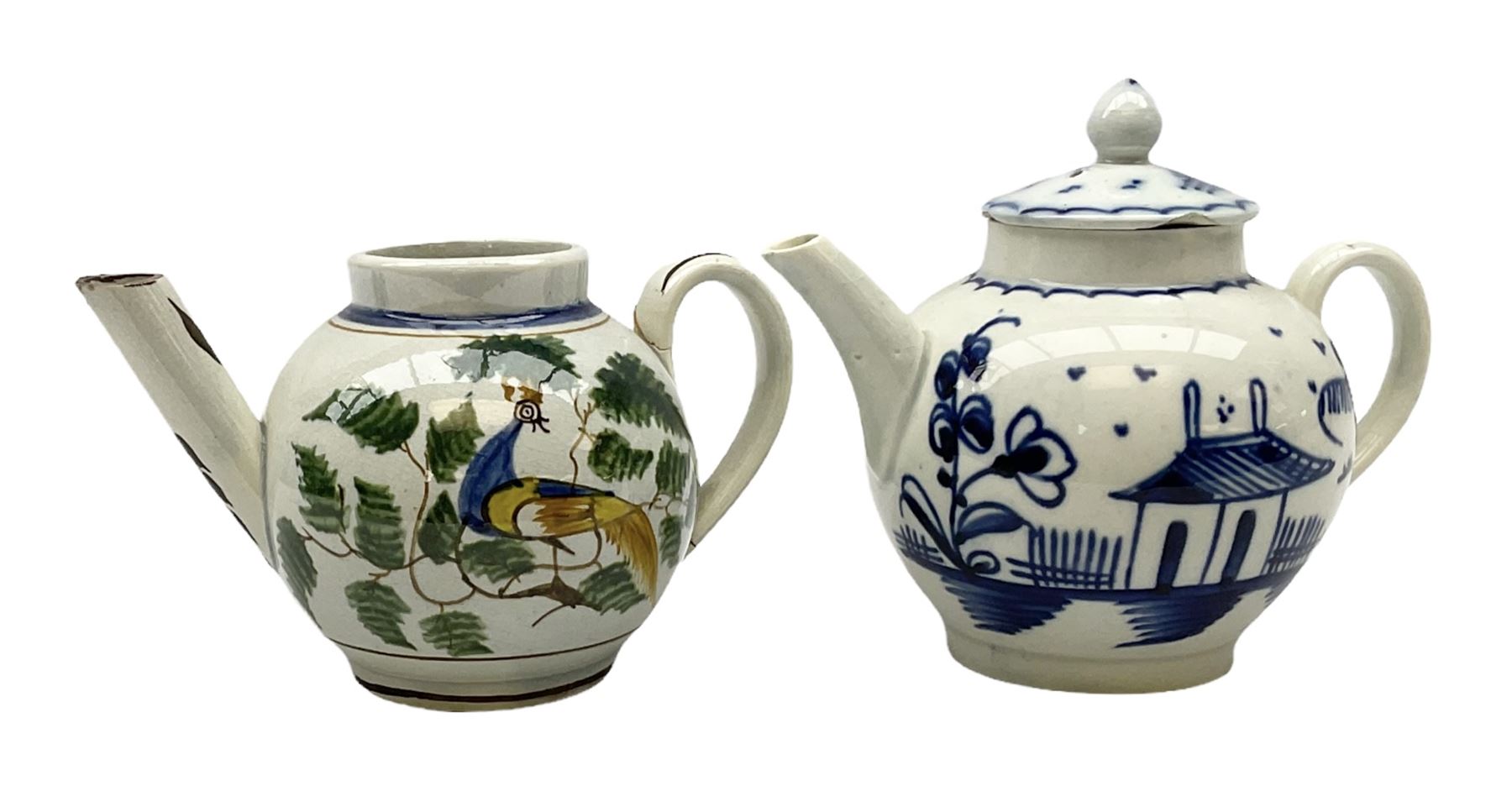 Two 18th century miniature or toy pearlware teapots, the first example lacking cover decorated with an exotic bird, the second with cover painted in underglaze blue with hut and fence, second example approximately H8cm