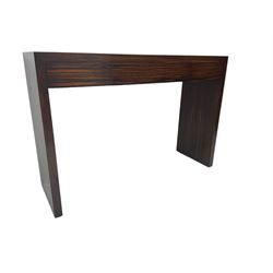 Mid-20th century macassar ebony console table, rectangular bookmatch veneer top, fitted with three drawers, raised on solid end supports; with matching over mantle mirror in Macassar ebony frame (92cm x123cm)