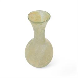 Two Roman glass funerary items, circa 1st century AD, comprising lachrymatory or tear bottle and glass unguentarium, tear bottle H10cm, unguentarium bottle H12cm
teardrop bottles were used by hired mourner to collect the tears at a funeral for the departed, unguentarium bottles housed oils or perfumes for the departed in the afterlife
By vendors repute items discovered in the Dead Sea area of the Holy Lands in the 1960s