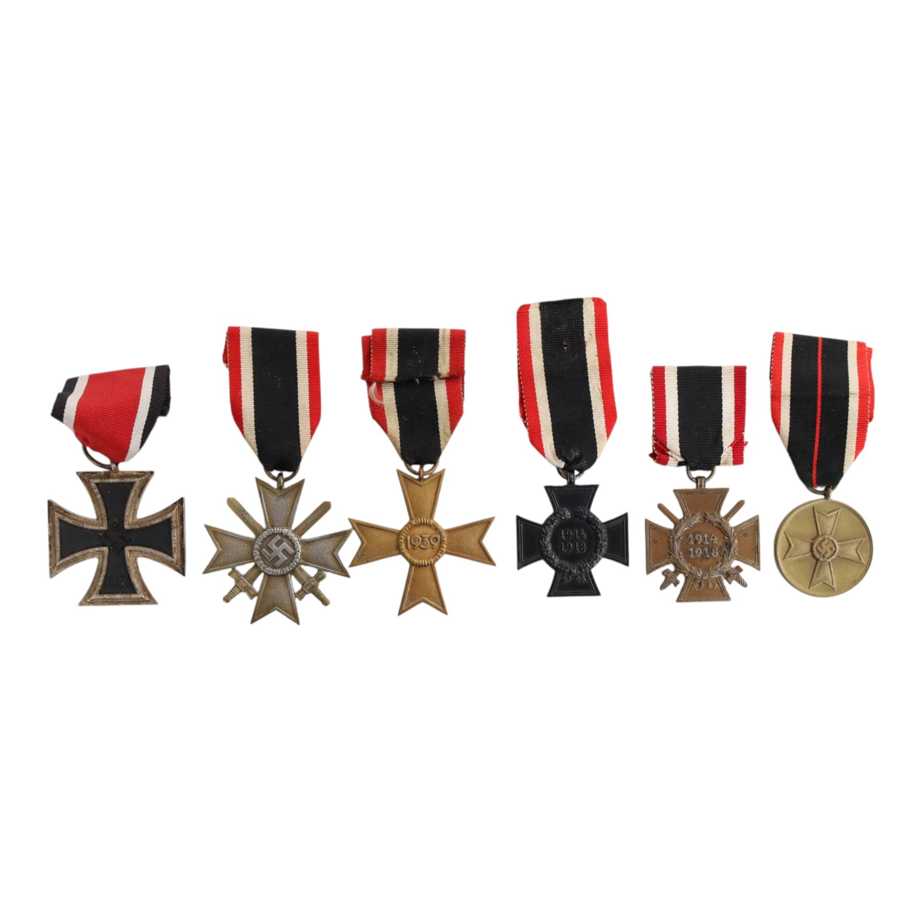 WWI and WWII German medals, including Iron Cross 2nd Class, War Merit cross with swords, Cross of Honor etc 