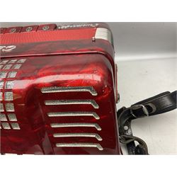 Clinkscale Crucianelli piano accordion in red pearline case with one-hundred and twenty buttons and forty-one keys L52cm; in carrying case