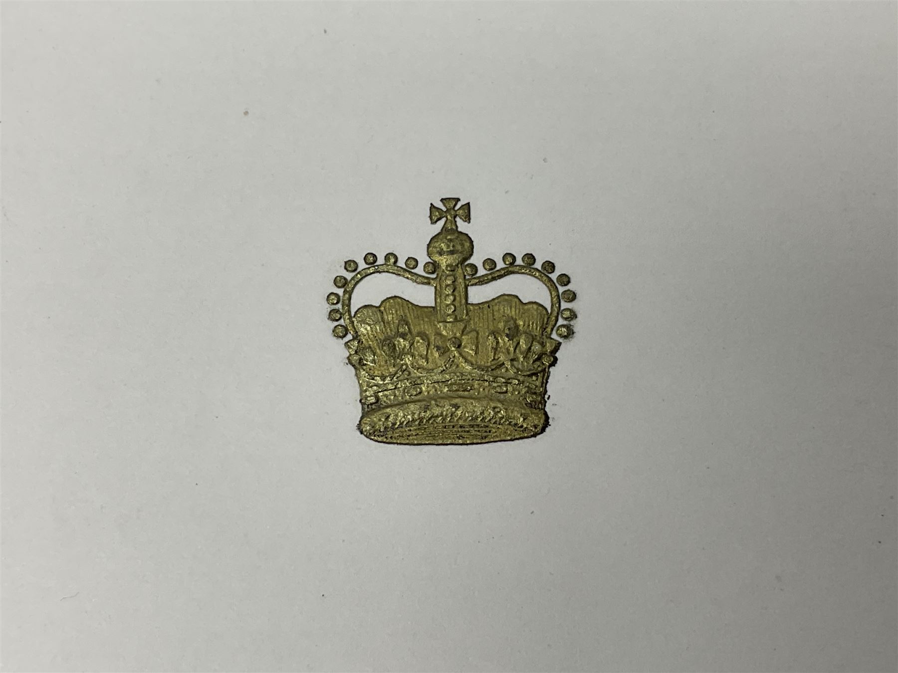 HM Queen Elizabeth II and HRH The Duke of Edinburgh - signed 1956 Christmas card with gilt embossed crown to cover, black and white photograph of the smiling Royal Couple with Prince Charles and Princess Anne on board Britannia, signed in ink 'Philip 1956 Elizabeth R',