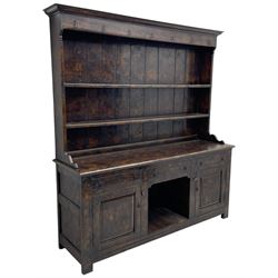 Bylaws of Leominster - 18th century design figured oak dog kennel dresser, the raised plate rack with projecting cornice over hooks and three tiers, moulded rectangular top over three drawers and two panelled cupboards, moulded frame and panelled sides, on stile supports