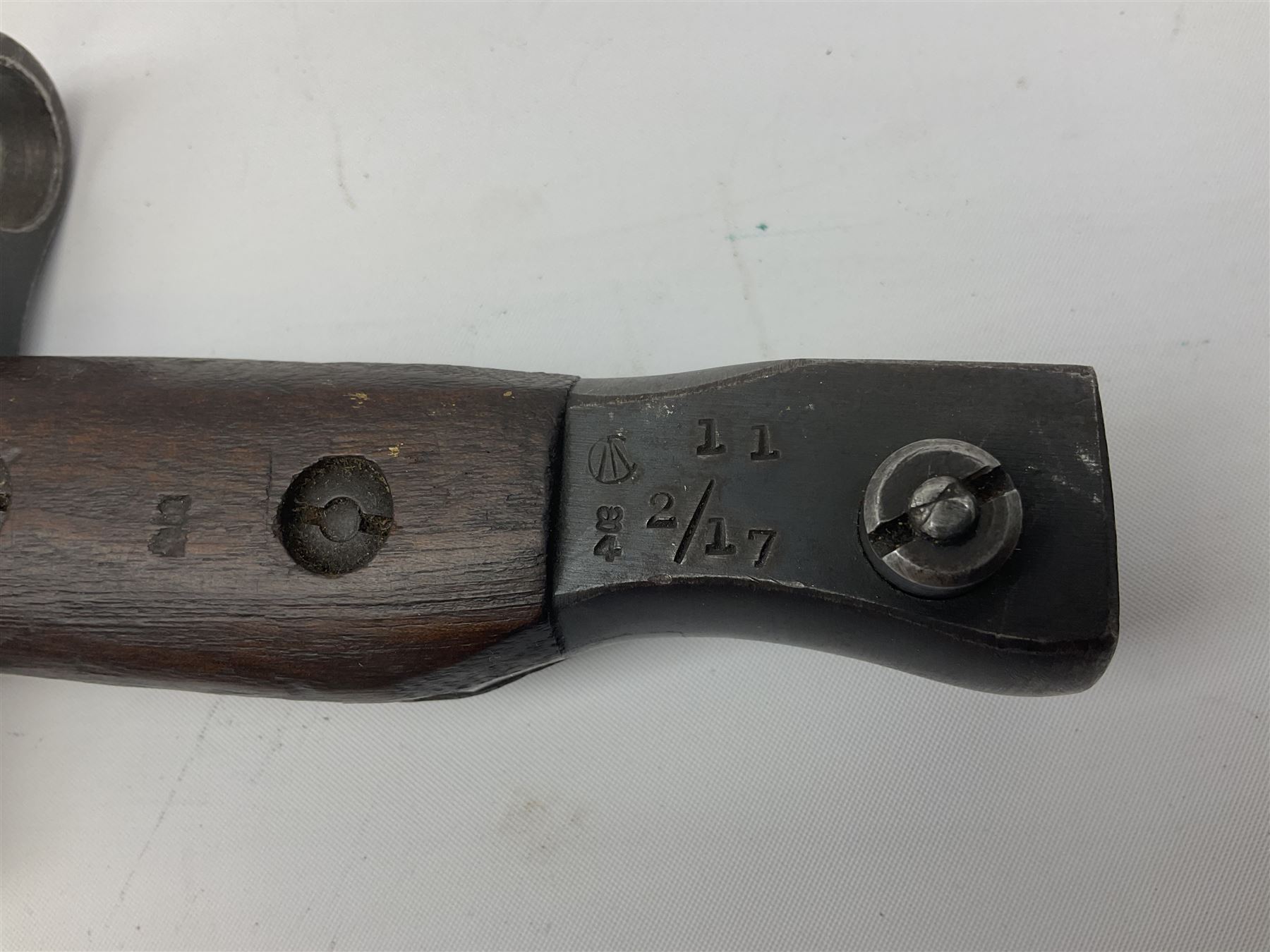 WW1 American Remington P14 rifle bayonet Model 1913, the 43cm fullered steel blade dated 5 17; in metal mounted leather scabbard L57cm overall; and WW1 Canadian Ross Rifle Co.1907 Model Mk.II bayonet, dated 2/17; in leather scabbard with frog (2)